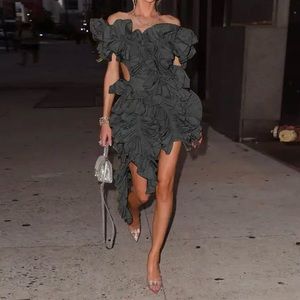 NWT - Black backless ruffle dress. Get holiday season ready!